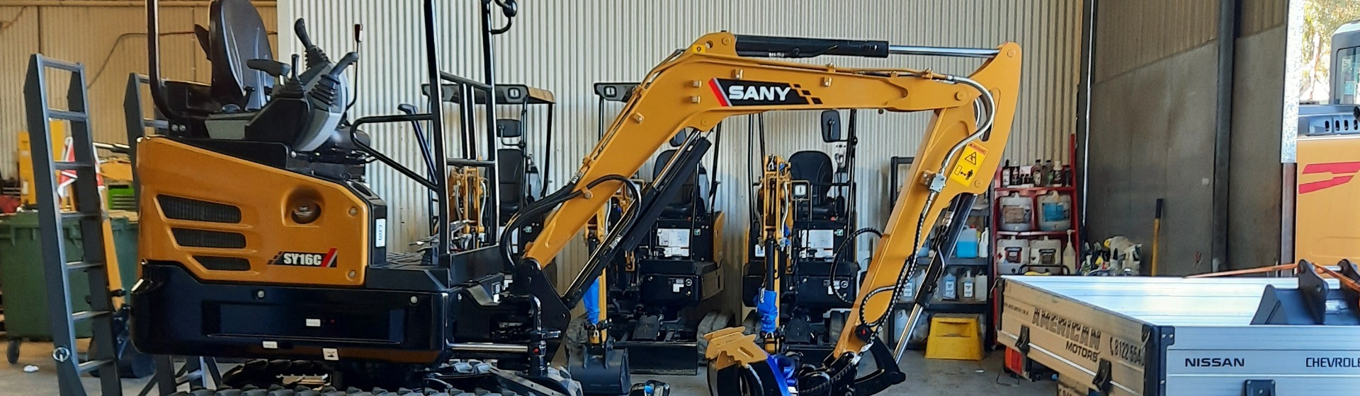 Happy Adelaide Heavy Machinery customers receiving their new Sany Excavators